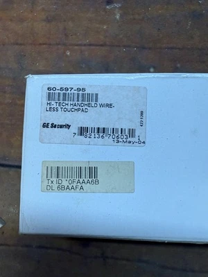 INTERLOGIX 60-597-95 HI-TECH HANDHELD WIRELESS TOUCHPAD - Image 1 of 2