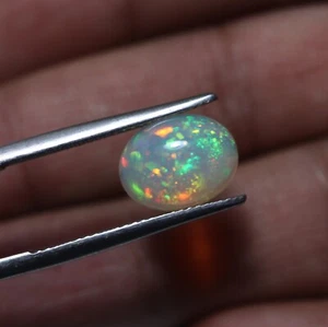 2.6 Ct 11.9x8.9 MM Natural AAA Grade Green Red Fire Ethiopian Opal Oval Cabochon - Picture 1 of 11