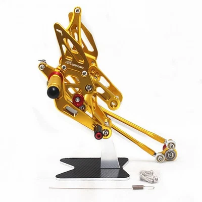 Juego trasero ajustable MAD-MOTO estriberas para CBR1000RR 2004-2007 DORADO Foto 1 de 4