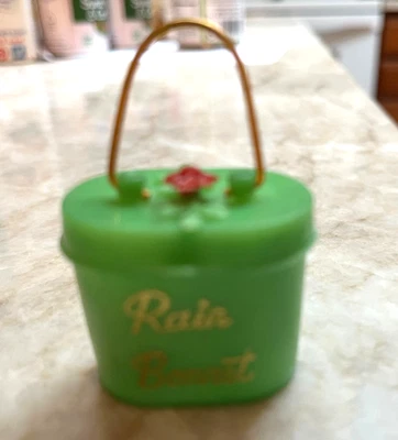 Mini estuche de viaje verde de plástico con capó de lluvia vintage de los años 60 nunca fuera de estuche Foto 1 de 3