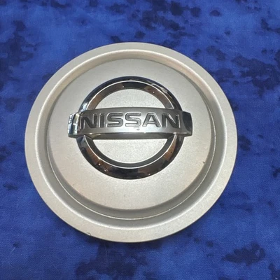 Tampa de cubo centro aro roda Nissan Xterra PRATA fabricante de equipamento original 40315 7z100 7z110 - Imagem 1 de 4