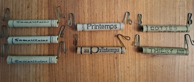 Lot 7 poignées porte-sacs anciennes publicitaires (printemps, samaritaine...) - Photo 1/4