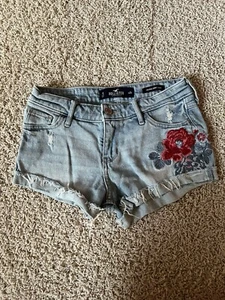 HOLLISTER Sz 0/ 24 Distressed Cut Off Blue Denim Embroidered Flower Jean Shorts - Picture 1 of 3