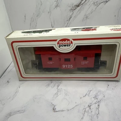 Model Power HO Red Safety 36’ Bay Window Caboose 9125  Train - Image 1 of 4