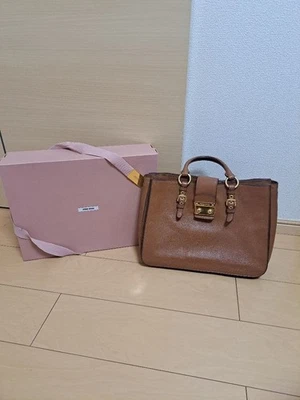 Auténtico Bolso de Hombro Miu Miu 2 Vías Cuero Camel con Correa para el Hombro Marrón Foto 1 de 4