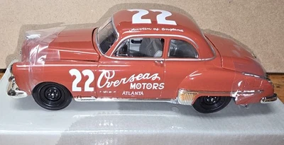1949 RED BYRON OVERSEAS MOTORS NAPA NASCAR 50TH ANNIVERSARY 1/24 DIECAST - Image 1 of 4