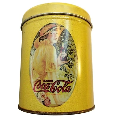 Vintage Coca Cola Tin Canister Yellow Lady Holding Coke Lidded Retro 1980s - Image 1 of 4