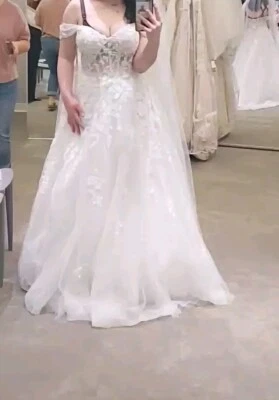 Vestido de novia blanco puro brillante corsé de tul con mangas desmontables Foto 1 de 4