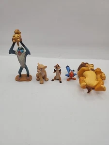 Figuras de PVC Disney El Rey León. 5 en total. Rafiki, Zazu, Timón, Mufasa, Nala - Imagen 1 de 7