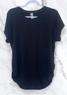 Camisa negra de manga corta New Balance para mujer talla 2XL para correr gimnasio lados fruncidos Foto 1 de 4