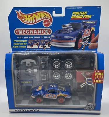 Vtg 1997 Hot Wheels MECHANIX Pontiac Grand Die-Cast X-Tool Transformer #44 - Image 1 of 4