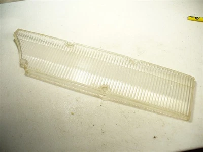 1963 Cadillac passenger side quartering lamp lens 5954218 - Image 1 of 2