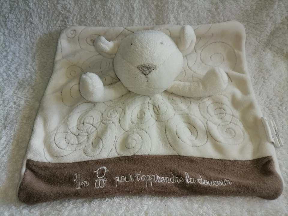 doudou plat mouton Obaibi Etat neuf - Photo 1/1