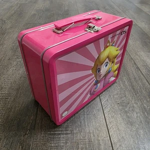 Fiambrera vintage de metal Princess Peach Nintendo DS rosa tamaño completo  - Imagen 1 de 5