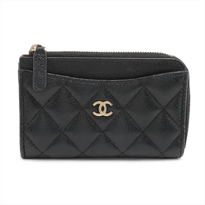 Monedero Chanel Matelasse piel de caviar negro dorado accesorios de metal serie aleatoria Foto 1 de 4