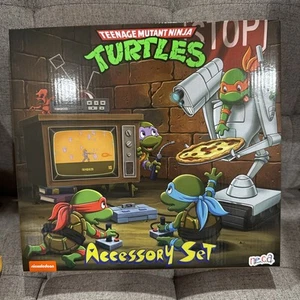NECA Teenage Mutant Ninja Turtles TMNT Dibujos Animados Conjunto de Accesorios Tortugas Bebé Nuevo - Imagen 1 de 5