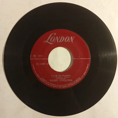GILBERT O'SULLIVAN –A WOMAN´S PLACE / TOO BAD- 1974 MEXICAN 7" SINGLE, POP VOCAL - Image 1 of 3