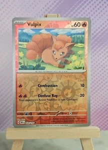 Juego de cartas coleccionables Pokémon: Vulpix (Holo inverso) 028/197 - Llamas de obsidiana - Estado casi nuevo - Imagen 1 de 2