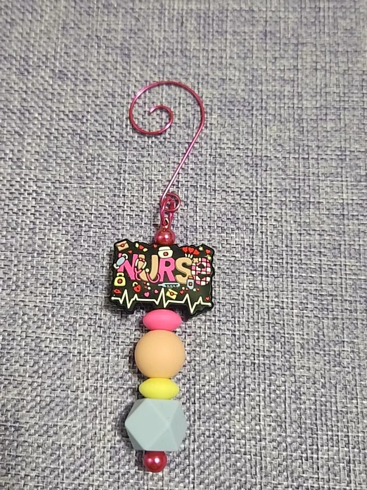 Handmade Beaded Purple Nurse Spiral Hook Ornament - Image 1 of 1