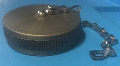 MS17349N36B BENDIX CONNECTOR MIL-DTL-22992 DUST CAP RCPT SIZE 36 w/CHAIN - Image 1 of 4