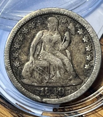 Moneda de diez centavos libertad sentada 1849 Foto 1 de 2