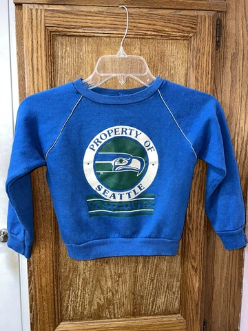 Vintage 80s Seattle Seahawks “ Property Of Seattle Seahawks” Youth Sweatshirt Cover