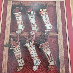 The Need'l Love Company Christmas Stocking Stuffers Cross Stitch Patterns #31 - Picture 1 of 6