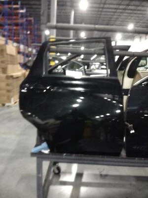 Nissan Versa 2017 puerta trasera derecha negra OEM 486440 usado 36.000 millas Foto 1 de 2