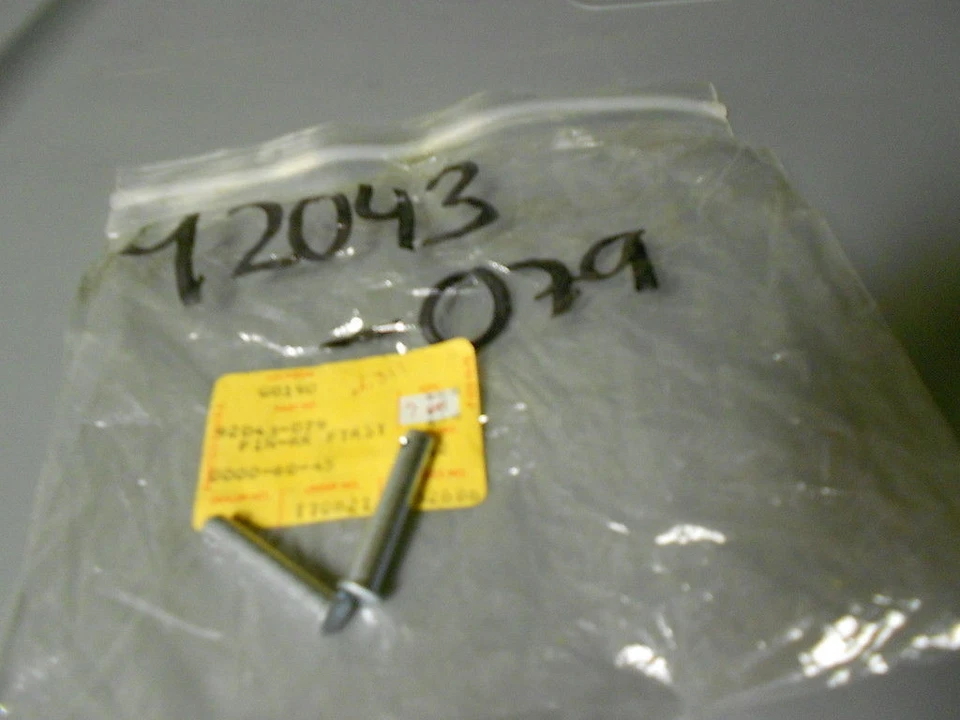 NOS 1973-1975 Kawasaki H1 Mach III Rear Pin Footrest Fitting PN:92043-079 - Image 1 of 1