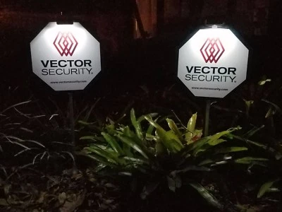 2 Vector Security Yard Signs + 6 Door/Window Deals + 2 Clip On Solar Lights  - Image 1 of 2