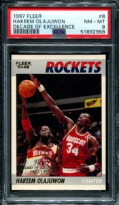 PSA 8 NM MINT 1997 FLEER HAKEEM OLAJUWON DECADE OF EXCELLENCE #8 ROCKETS B142 - Picture 1 of 1