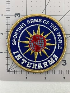 Vintage Sporting Arms of the World - INTERARMS - Gun Shooting Patch - Picture 1 of 2