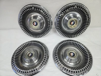 Juego de 4 tapacubos de acero inoxidable Buick Lesabre Special 1965 15 pulgadas OEM GM Foto 1 de 4
