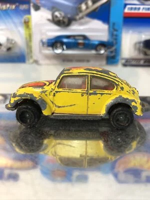 Coche Tomica TOMY Nº F20 Volks Wagen Beetle Bug 1977 amarillo vintage diecast 1:64 Foto 1 de 4