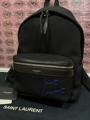 Mochila Saint Laurent City de lona negra con logotipo de cuero usada Foto 1 de 4