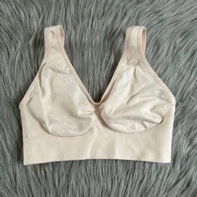 Sujetador deportivo inalámbrico para mujer talla pequeña rosa claro sin cables elástico Foto 1 de 4