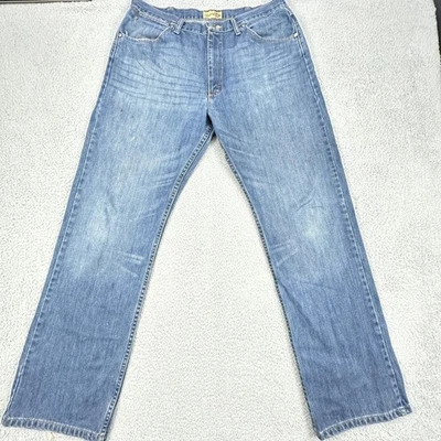 Pantalones de mezclilla Wrangler 20X para hombre 36x34 azul desgastado calce relajado desgastados Foto 1 de 4