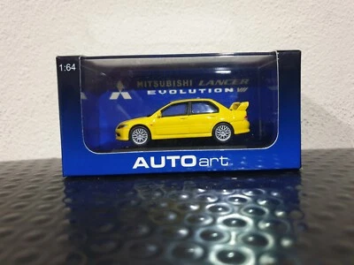 Autoart Mitsubishi Lancer Evolution VII 1/64 (amarillo) Foto 1 de 4