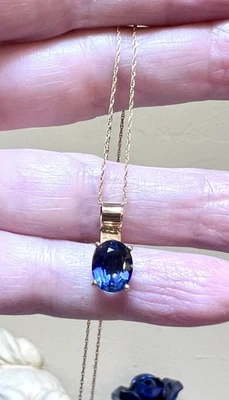 Hermoso Diseñador 14 Kt. Collar de piedras preciosas de iolita azul facetadas de oro amarillo y oro amarillo Foto 1 de 4