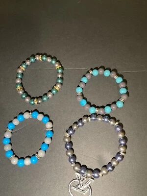 Blue beaded bracelet with gray in it - Image 1 of 4