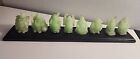 Set Of 8 Green Happy Laughing Buddha Faux Jade Figurines on Wooden Stand