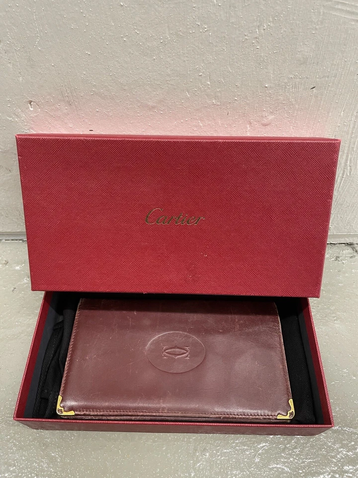 Authentic CARTIER Burgundy Calf Leather Must De Cartier Bifold Envelope Wallet - Image 1 of 4