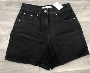 Pantaloncini a vita alta denim nero Next nuovi con etichette UK 8 vacanze estive cotone - Foto 1 di 3