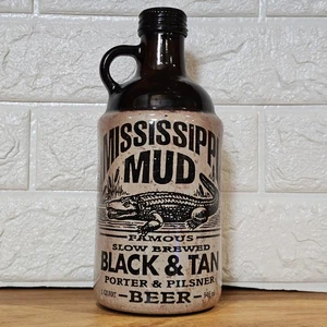 9" EMPTY Mississippi Mud Beer Bottle Vintage Black Tan 1 Pint with Original Cap - Picture 1 of 6