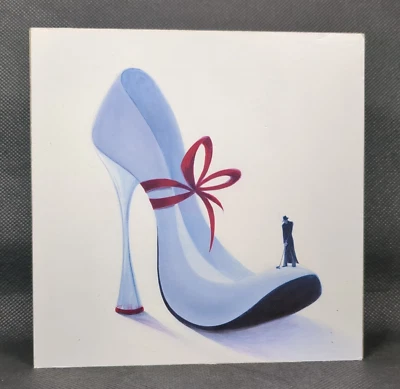 Imagen en bloque de Inna Panasenko de su colección "Stilleto" - Hombre jugando al golf Foto 1 de 4