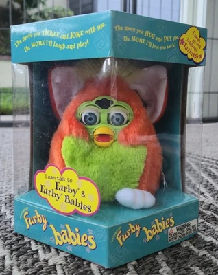 ОРИГИНАЛЬНЫЙ 1999 FURBY BABY оранжевый/зеленый с желтой гривой новый в коробке - Изображение 1 из 4
