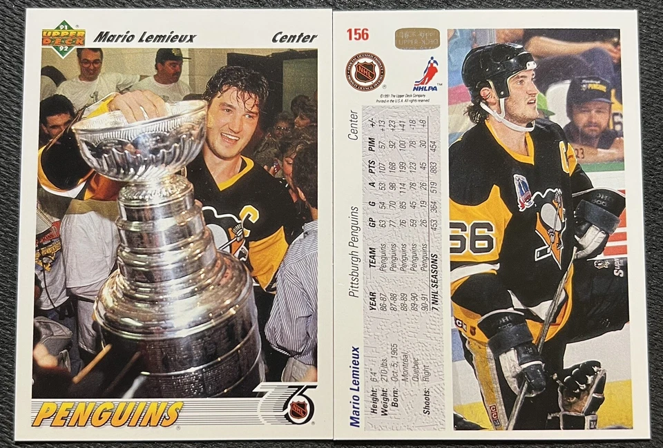 1991/92 UPPER DECK MARIO LEMIEUX (PENGUINS) HOLDING THE STANLEY CUP #156 NM/MT - Image 1 of 1