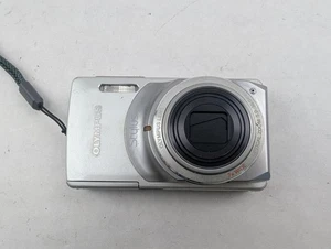Olympus Stylus 7010 Silver Digital Camera {12MP} - READ - Picture 1 of 6
