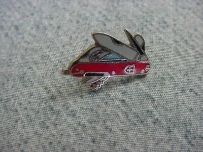 Vintage miniatura VICTORINOX, esmaltado, cuchillo solapa/pasador de sombrero - temprano, EE. UU. Foto 1 de 2