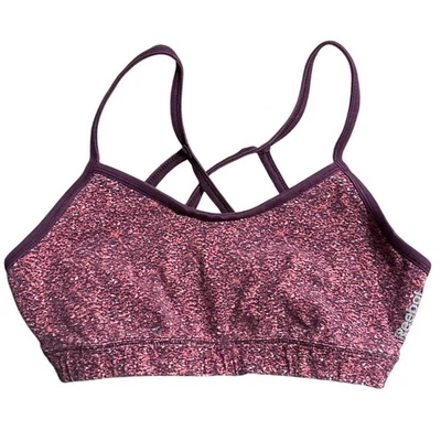Sujetador deportivo con tiras con estampado rosa y púrpura Reebok Top de entrenamiento para mujer talla S Foto 1 de 4